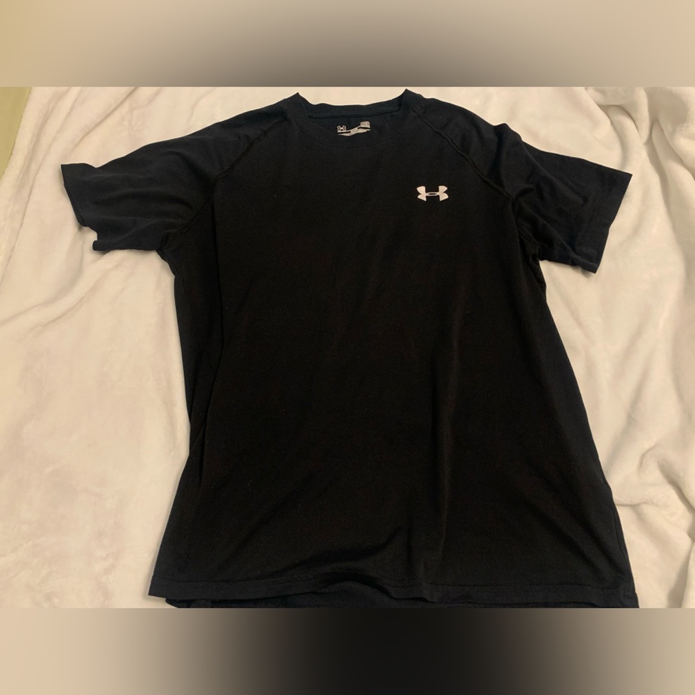 Under armer shirt.